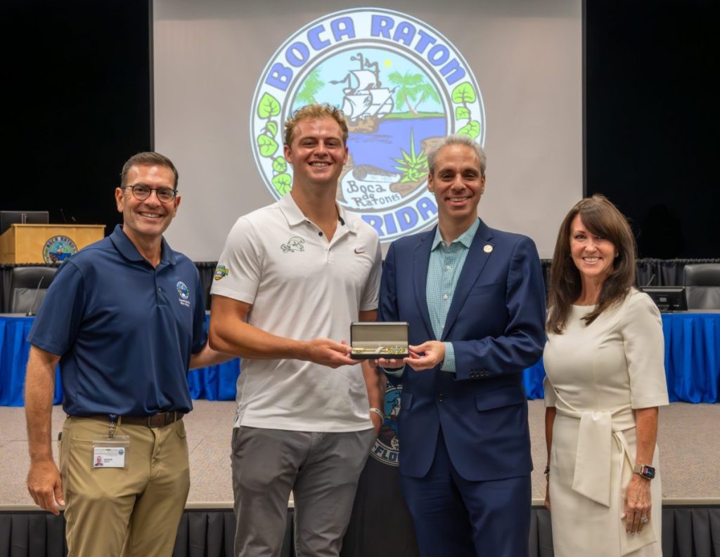 Boca Raton Mayor Scott Singer awards Michael Pratt with a Key to the City of Boca Raton. Photo courtesy of City of Boca Raton, BocaTV